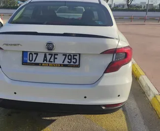 Прокат машины Fiat Egea №4225 (Механика) в аэропорту Анталии, с двигателем 1,4л. Бензин ➤ Напрямую от Нурулла в Турции.